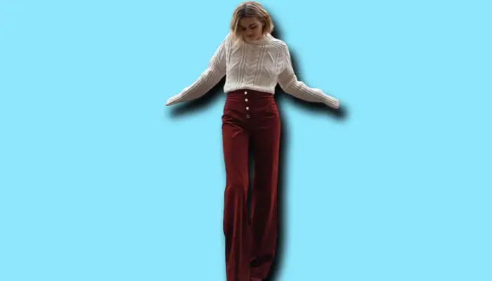 A White Cable Sweater With Maroon Pants