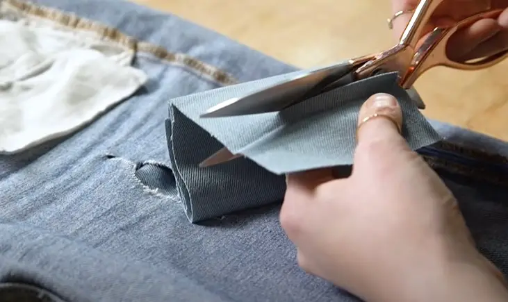 Patching with Denim or Fabric to Preserving distressed jeans and preventing additional tears